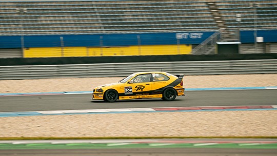 SR BMW 318ti Cup racing on the track at Assen